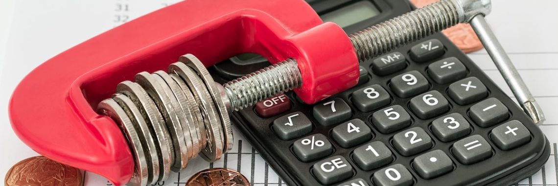 calculator and coins